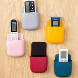 Self-Adhesive Sticky Multi-Purpose Mobile Pocket Holder Wall-Mount ( Random Colors Will Be Sent)