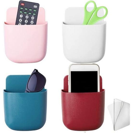 Self-Adhesive Sticky Multi-Purpose Mobile Pocket Holder Wall-Mount ( Random Colors Will Be Sent)