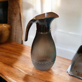 Royal Shahi 1.5-Litres Plastic Transparent Oil & Water Jug (Random Colours Will be Sent)